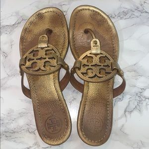 Tory Burch gold millers size 7